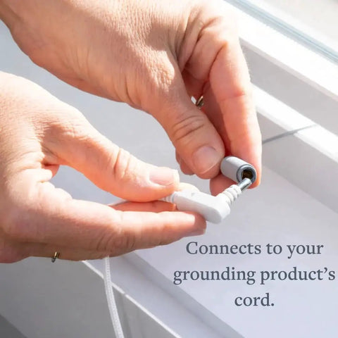 Close-up of hands connecting a cord to the Outdoor Grounding Rod Kit with 40FT Conductive Cord Copper Earthing Stake