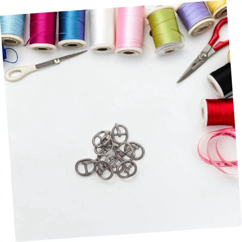 Mini Alloy Belt Buckles Set For Doll Clothes And Tiny Belts, 150 Pcs Small Single Prong Fasteners In Silver on craft table