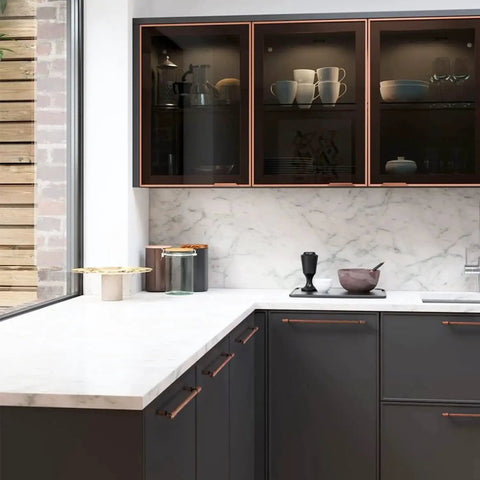 Modern kitchen with Six Pack 5.04 Inch Center To Center Antique Copper Drawer Pulls Red Bronze Bar Handles on dark cabinets.