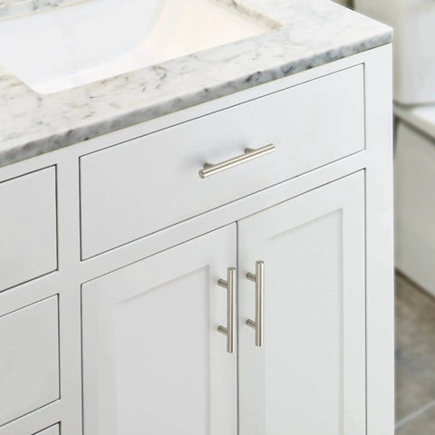 30 Pack 5 Inch Cabinet Pulls With 3 Inch Hole Centers Zinc Alloy Handles In Brushed Nickel Finish Installed on White Cabinet