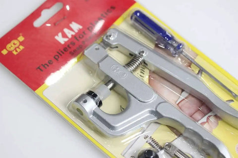 Snap Pliers Kit For No-Sew Button Snaps Handheld Press Attacher With T3 T5 T8 Dies shown in packaging, includes tools