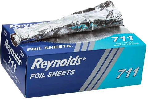 Blue box of Pop Up Interfolded Aluminum Foil Sheets In Silver, 500 Count Box, with foil sheet partially extracted