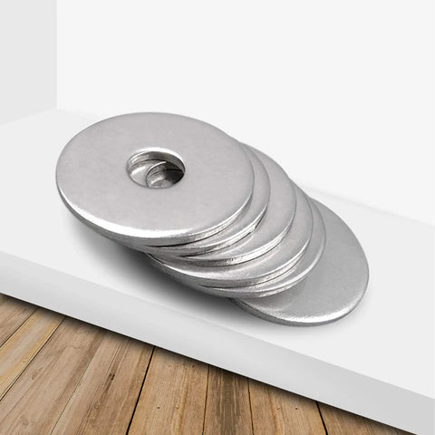 Stack of stainless steel Fender flat washers, 1/4 in ID and 1 in OD, 304 stainless