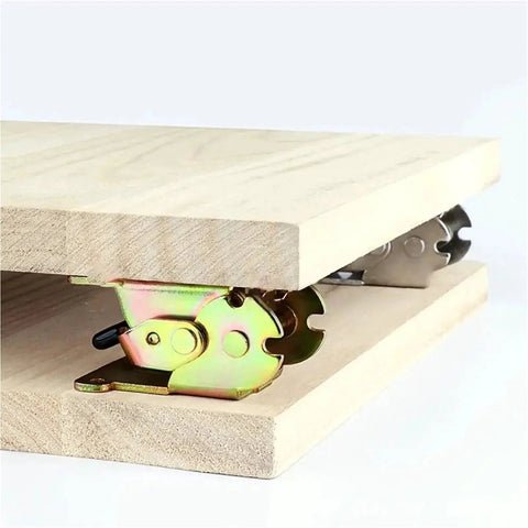 Close-up of Tough As Nails Folding Leg Bracket Set Four Pack 180 Degree Foldable Industrial Locking Hinges installed on wood