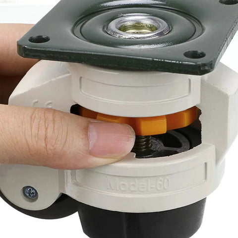 Close-up of a hand adjusting a Four Piece Leveling Casters For Workbenches With Nylon Wheels And Rubber Feet Retractable Caster Set