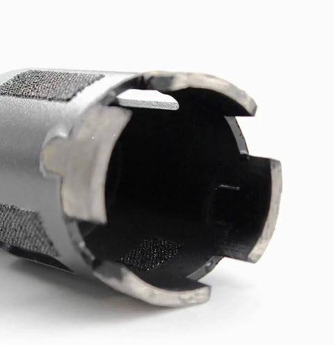 Close-up of Dry And Wet Diamond Core Drill Bit And Hole Saw Set One And A Half Inch For Granite And Concrete With T Segments