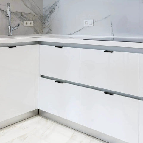 Modern kitchen with 6 Pack Finger Edge Pulls For Cabinets 80mm Length Matte Black Concealed Cabinet Handles installed on white drawers.