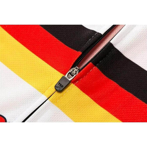 Close-up of a colorful striped fabric with a visible zipper.