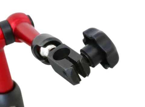 Close-up of Pro Grade Dial Indicator And Magnetic Base Combo From Accusize Industrial Tools; red magnetic stand detail.