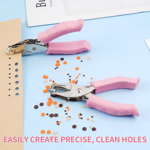Dual Hole Punch Set With Soft Grip Handles In Pink for crafts with 1/8" and 1/4" holes, showing clean cuts in paper confetti.