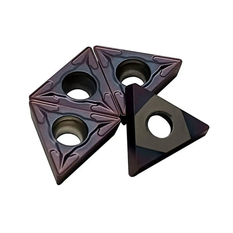 Three Rugged Carbide Turning Inserts 20 Pcs TCMT21.51 TCMT110204 with PVD coating for lathe tool holders shown from top angle.