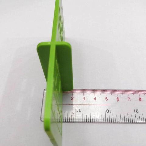 Side view of green 35mm hinge template router jig with marked measurements for woodworking installations