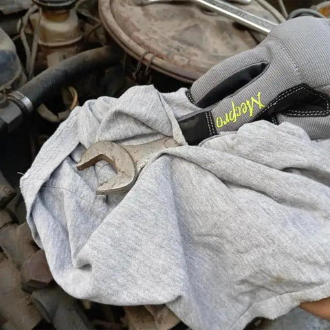 Bulk Recycled Gray T Shirt Rags 50 Lb Bag Cotton Cleaning Cloths For Garage Paint Dust Oil Wood And Multi Surface Wiping Great Absorbency For Quick Cleanup In Workshops And Industrial Environments shown with wrench
