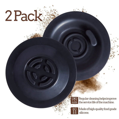 Front view: two black 54mm silicone Breville backflush discs for espresso machines.