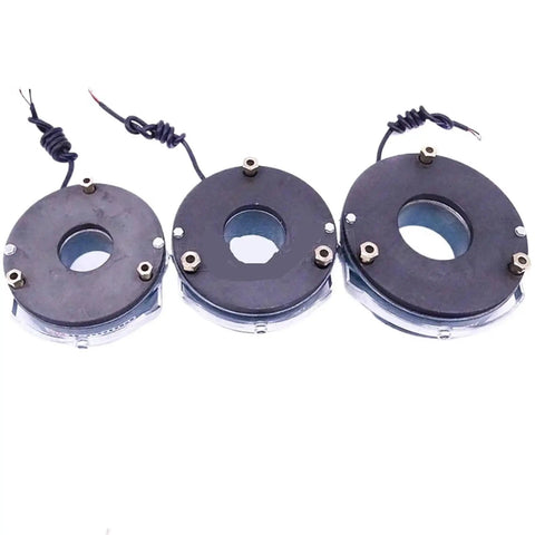Three black electromagnetic power-off brake assemblies with central bore and mounting screws.