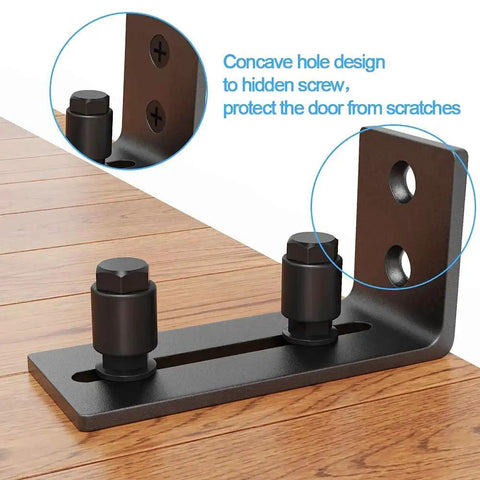 Black Floor Guide And Bottom Wall Guide Set For Barn Doors With Flush Design Flat Bottom Stay Roller Two Pack Heavy Duty Cast Iron Rust Resistant Powder Coat 5 Mm Thick 4.72 In Length 5.26 In Height 2.05 In Wide, showing a side view with concave hole design.
