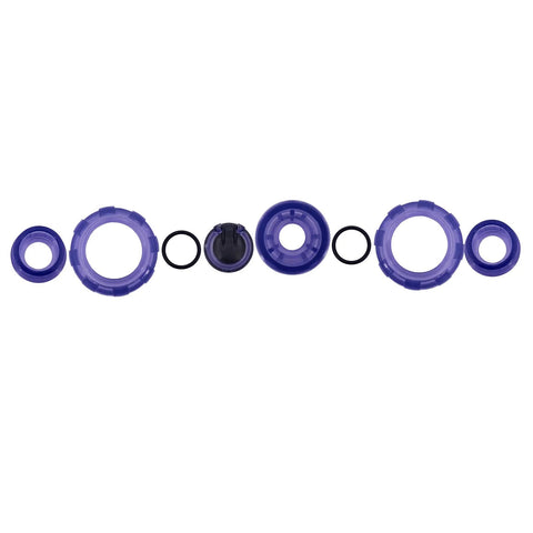 UPVC 3/4 inch check valve repair kit with blue plastic rings and black O-rings, laid out in a row