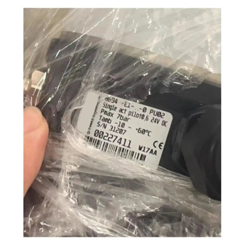 Close-up of DN40 electric proportional valve in plastic bag; 24V DC, 7 bar max, -10 to +60°C