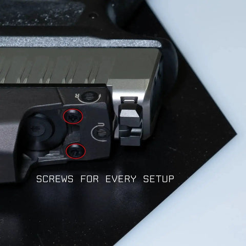 Close-up of Go To Red Dot Pistol Mount Screw Kit With Sixteen Common Screws Including M3 And M4 installed on a pistol.