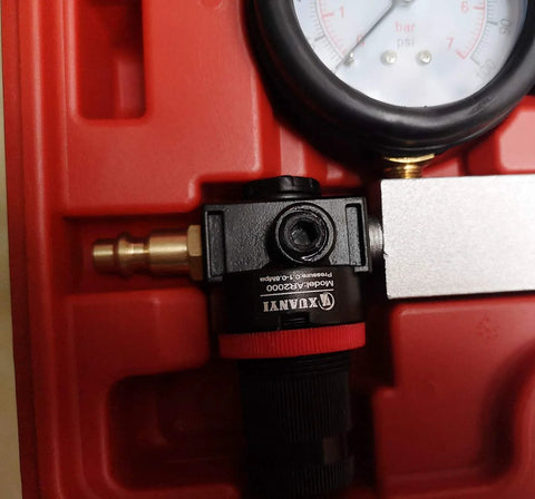 Cylinder leak-down tester kit for engines, red unit with black valve block and dual gauge