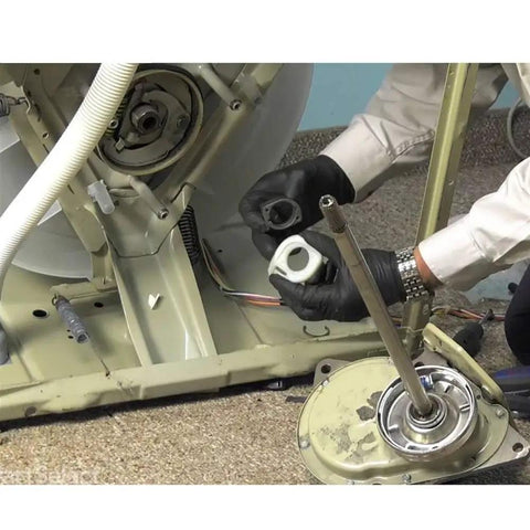 Installation of One Way Bearing 6005 ND14 2RZ for washing machines showing chassis and new bearing placement.