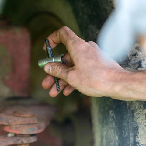 Grease Fitting Multi Tool For Easy Install And Extraction, Large Size, shown in use on industrial equipment, LockNLube compatible.
