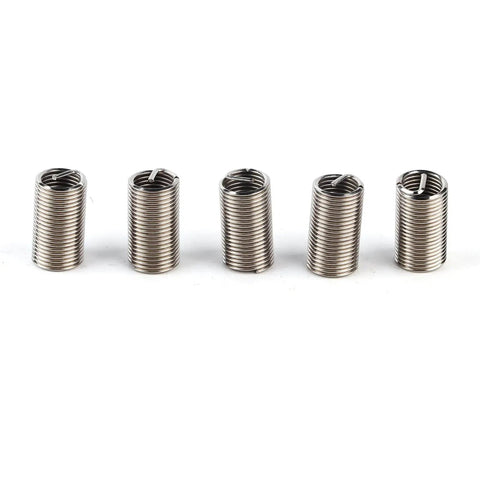 Five M10x1.25 stainless steel helical threaded inserts with locking wire sleeves for anti-loosening and repair on metal and wood.