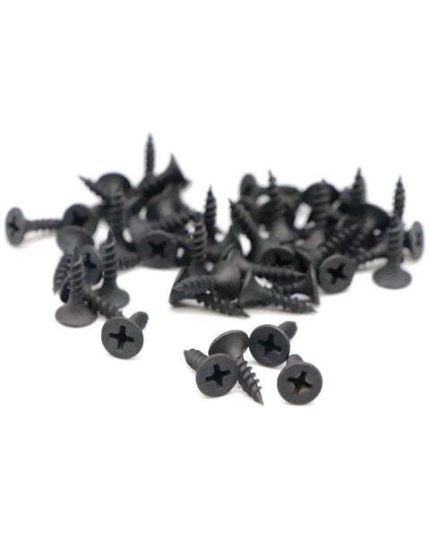 Size Six Pro Grade Drywall Screws Five Eighth Inch Flat Head Phillips Fine Thread Sharp Point For Wood And Drywall Carbon Steel 1022A Black Phosphate Finish 100 Pack scattered on a white surface.