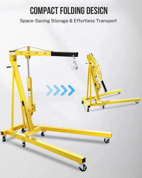 Front view of a yellow 2-ton hydraulic folding engine hoist on six casters.
