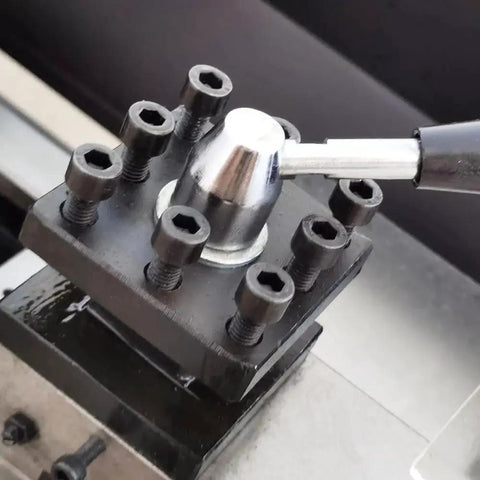 Close-up of the tool post on Industrial Metal Lathe Machine For Home Shop And Workshop With 10.2 Inch Swing And 27.5 Inch Distance Between Centers Geared Head Lathe High Torque Variable Speed Turning 115-1620 RPM AC 110V 1HP By TechTONGDA