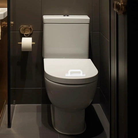 Two Pack Adhesive Cabinet Handles Stick On No Drill Pulls installed on white toilet seat in modern bathroom setting