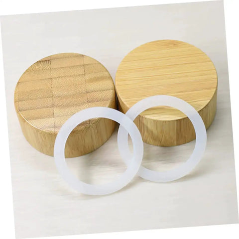 5 Pack Silicone Sealing Rings Replacement Gaskets For Coffee Pot Lids Espresso Pots And Canning Jars shown on wooden lids