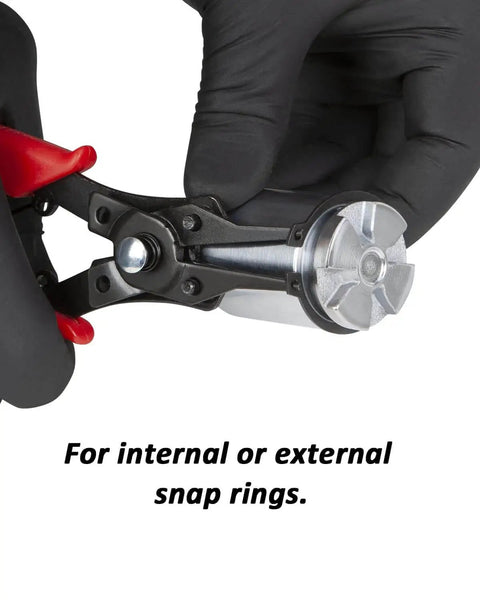 Close-up of All In One Snap Ring Pliers Set With Interchangeable Jaw Heads For 45 90 And 180 Degree Angles in use