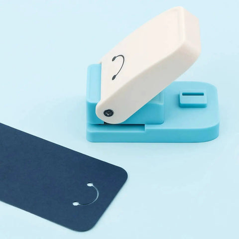 Versatile Hangtag Punch For DIY Jewelry Displays And Card Tags, showing blue punch tool with tag, fits 80-500 GSM paper.