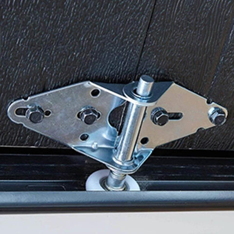 Close-up of Crazy Quiet 2 Inch Nylon Garage Door Rollers With Sealed 6200ZZ Bearings, installed on garage rail system.