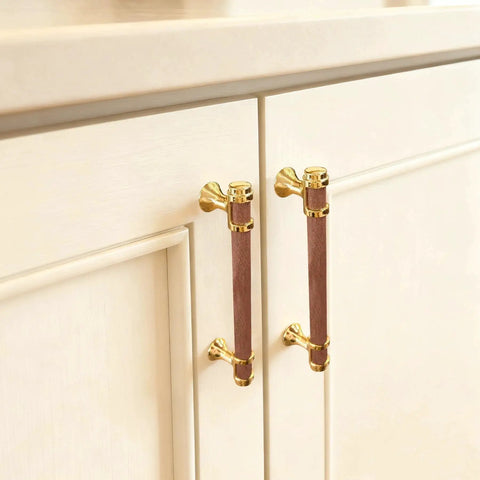 10 Pack 5 Inch Cabinet Pulls In Wood And Gold Finish installed on a kitchen cabinet, round wood handles with 128mm center to center