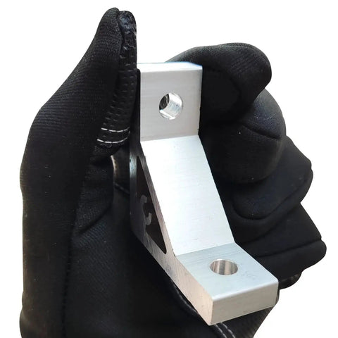 Gloved hand holding Heavy Duty 10 Series L Bracket Connector Kit For 1010 Aluminum Extrusion