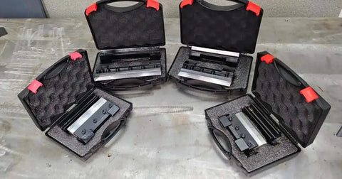 Multiple cases with 6 Inch Magnetic Vise Mount Metal Brake Bender for DIY metalworking, showing removable fingers, on a workbench.
