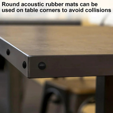 Black Round Adhesive Bumper Pads 300 Pcs Combo Pack In 3 Sizes on table corner for protection and sound dampening.