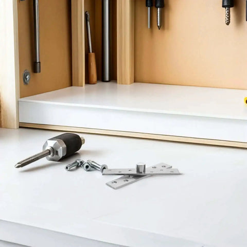 Six Piece Built Tough Heavy Duty Stainless Steel Hidden Door Pivot Hinges Set displayed on workbench