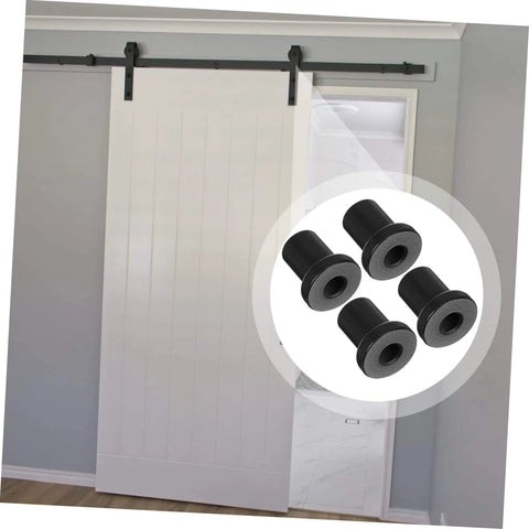 Four Pack Replacement Carbon Steel Track Spacers Set For Barn Doors And Sliding Door Hardware Heavy Duty Connector Spacers To Fix Tracks To Wall Ideal For Garage Basement Farmhouse Doors And Wall Mount Tracks showing black spacers in front of a white barn door installation.