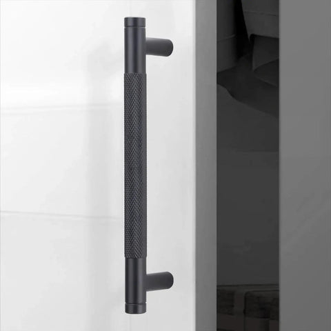 Side view of 10 Pack 5 Inch Matte Black Kitchen Cabinet Handles Knurled Cabinet Pulls for Cabinets and Drawers installed on a white door
