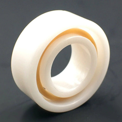 R188 full ceramic ball bearing; white ceramic races with orange seal, 1/4 in bore, 1/2 in outer diameter.