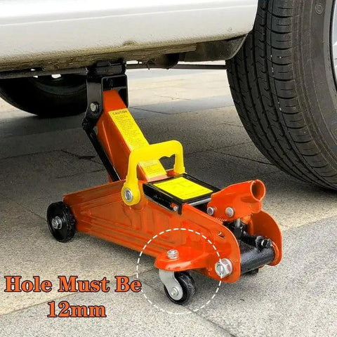 3-ton floor jack with caster wheel set for 12mm stem, orange finish, universal fit, supporting vehicle, exposed wheel details.