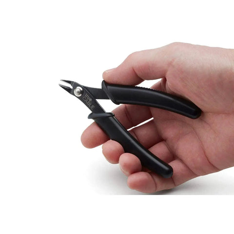 Hand holding Pro Grade Flush Cutter For Wire Up To 16 AWG Precision Sharp Cutting Pliers For Ethernet Cabling Electronics Jewelry And Crafts