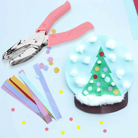 Handheld Paper Hole Punch Set With 1/16 Inch Small Circle And 1/8 Inch Medium Circle One Hole Punch Tool with pink grip on craft table