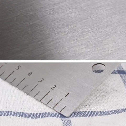 Close-up of Cake Scraper And Leveling Tool Set Stainless Steel With PP Handle Adjustable Frosting Spatula on fabric
