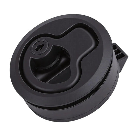 Close-up of round black flush-mount hatch latch for marine cabinets and drawers