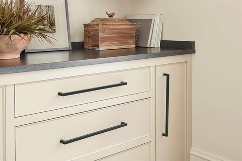 Matte Black Cabinet Pull For Modern Cabinets And Furniture Monument Collection 13 Inch Overall Length 12 5 8 Inch Center To Center Mounting Durable Metal Drawer Pull Amerock BP36911FB installed on light cabinets