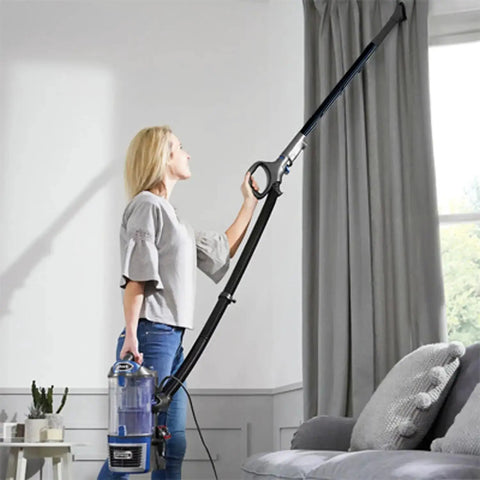Person using Five Pack 1.25 Inch Vacuum Extension Wands With 1.38 Inch To 1.25 Inch Hose Adapter For 32mm And 35mm Vacuum Cleaners